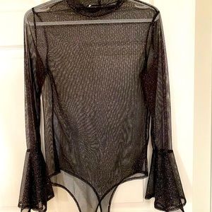 Sheer sparkly body suit